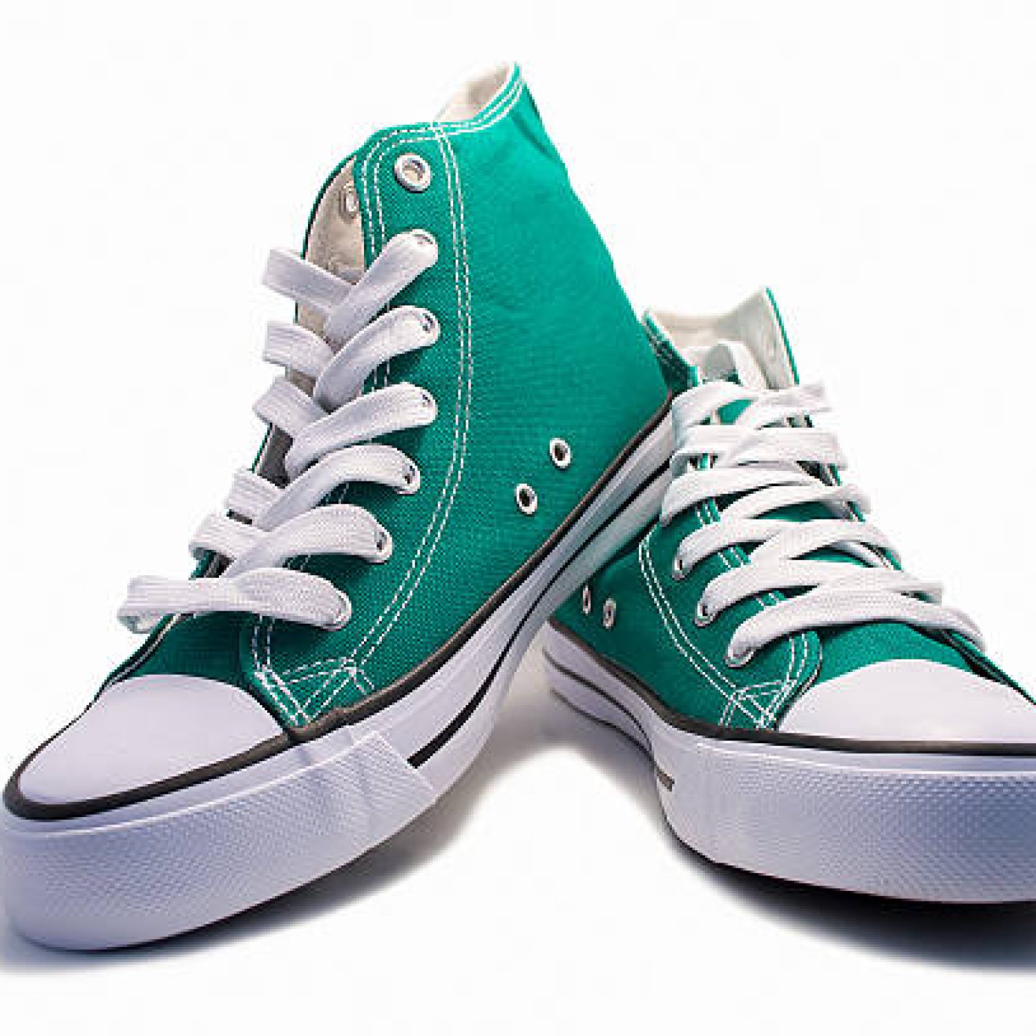 a pair of green vintage shoes isolated on white background